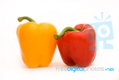 Yellow And Red Bell Peppers Stock Photo