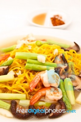Yellow Noodle Shrimps And Vegetables Stock Photo