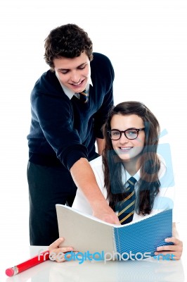 Young Boy Helping His Friend Stock Photo