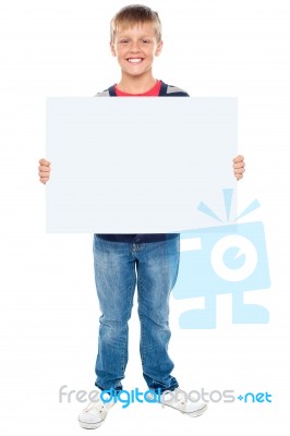 Young Boy Holding Blank Board Stock Photo