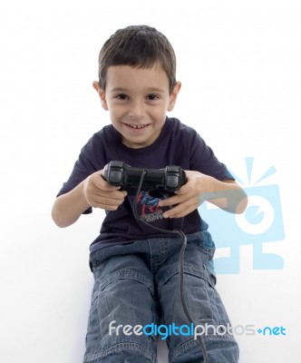 Young Boy Playing Video Game Stock Photo