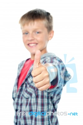 Young Boy Showing Thumbs Up Stock Photo
