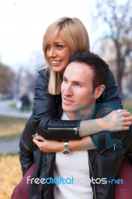 Young Couple In Park Stock Photo
