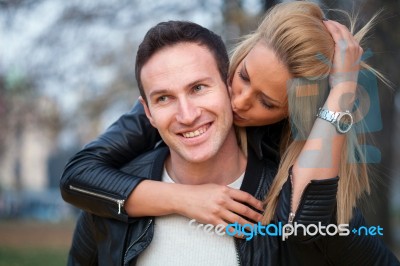 Young Couple In Park Stock Photo