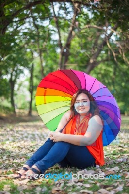 Young Fat Woman Sitting Stock Photo