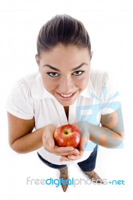 Young Female Holding An Apple Stock Photo