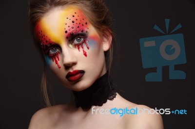 Young Female Model With Bloody Eyes Makeup Stock Photo