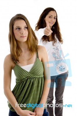 Young Females With Thumbs Up Stock Photo