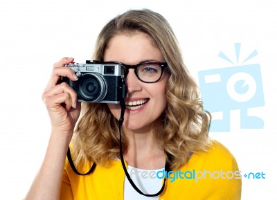 Young Girl With Camera Stock Photo