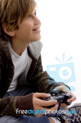 Young Kid Enjoying Videogame Stock Photo