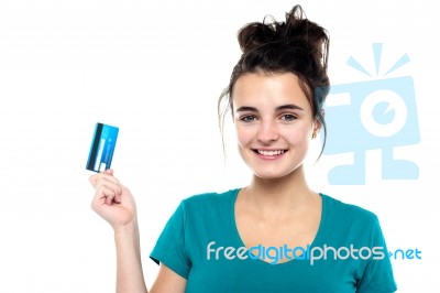 Young Lady Holding Credit Card Stock Photo