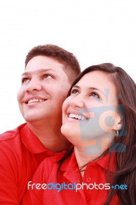 Young Loving Couple Looking Up Stock Photo