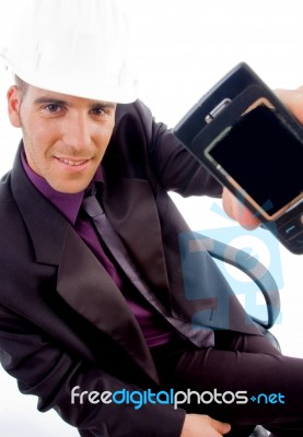 Young Male Architect Showing His Cell Phone Stock Photo
