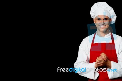 Young Male Chef Posing In Uniform Stock Photo