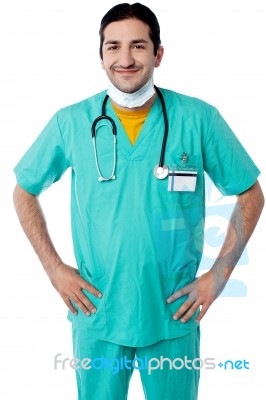 Young Male Physician Posing Confidently Stock Photo