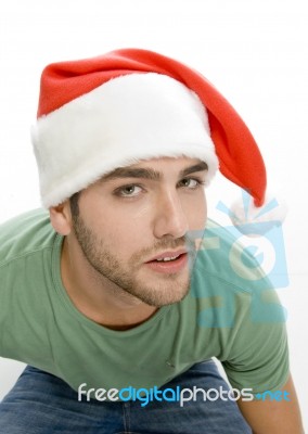 Young Male Wearing Christmas Hat Stock Photo