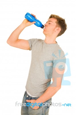 Young Man Drinking Energy Drink Stock Photo