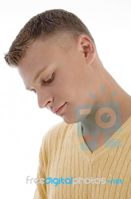 Young Man Looking Down Stock Photo