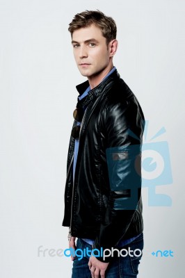 Young Man Wearing Leather Jacket Stock Photo