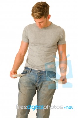 Young Man With Empty Pockets Stock Photo