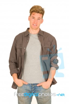 Young Man With hands in pocket Stock Photo