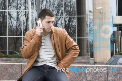 Young Men With Cellphone Stock Photo