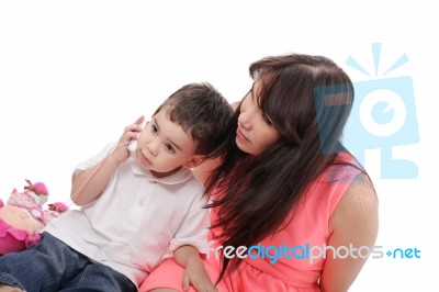 Young Mother And Her Son Spend Time Together.  Focus In The Litt… Stock Photo