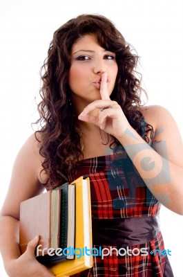 Young Student Asking To Keep Silent Stock Photo