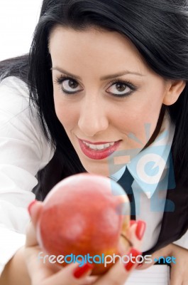 Young Student Holding An Apple Stock Photo