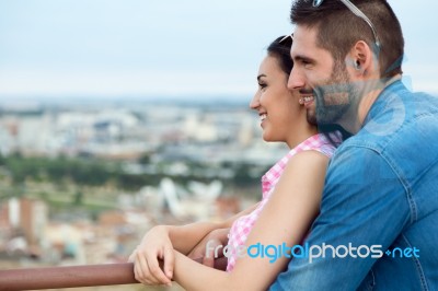 Young Tourist Couple Looking At The Views In The City Stock Photo
