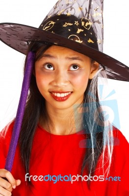 Young Witch With Stick Stock Photo