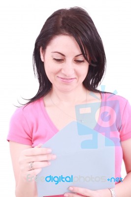 Young Woman Opening A Letter Stock Photo