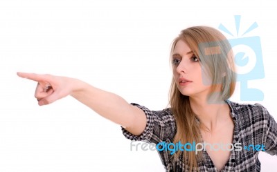 Young Woman Pointing Stock Photo