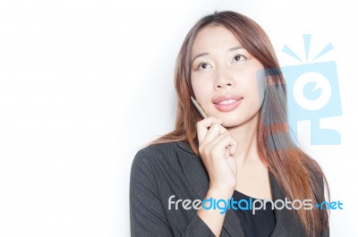 Young Woman Thinking Stock Photo