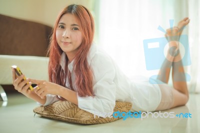 Young Woman Using Smart Phone Stock Photo