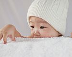 A Cute Little Baby Stock Photo