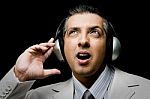 Adult Businessman Listening Music Stock Photo
