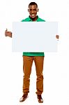 African Male Holding Blank Board Stock Photo