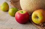 Apples On Wooden Boards Stock Photo