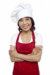 Asian Female Chef With Crossed Arms Stock Photo