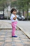 Asian Kid Children Standing Beside Street Road With Relaxing Emo Stock Photo
