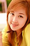 Asian Woman Eating Dessert Stock Photo