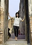 Asian Woman Enjoying At Buddhist Temple In Thailand Stock Photo