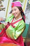 Asian Woman In Hanbok Drinking Tea Stock Photo