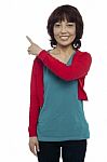 Asian Woman Pointing And Standing Stock Photo