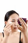 Asian Young Woman Doing Make Up Stock Photo