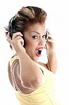 Back Pose Of Woman With Headphone Stock Photo
