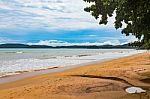 Beach In Thailand With A Dark Sky In The Background Stock Photo
