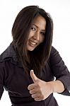 Beautiful Asian Woman Showing Thumbs Up Stock Photo