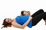 Beautiful Pregnant Woman And Her Daughter Stock Photo